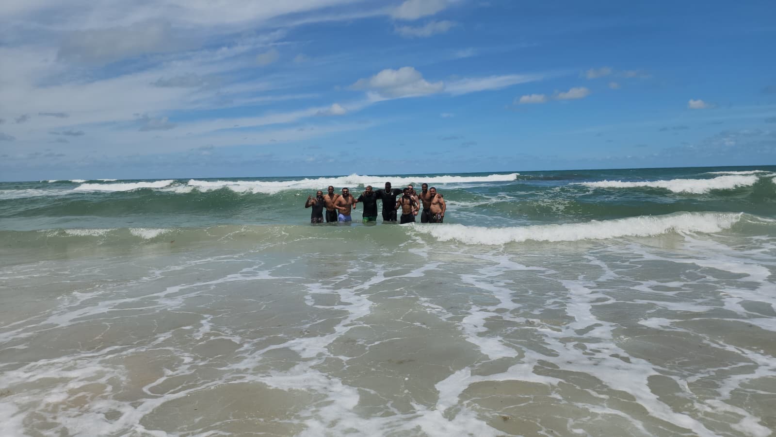 Men's Ministry celebrating together in the water